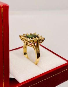 Beautiful Vintage 14k Yellow Gold Natural Green Tourmaline Ring with Halo round Diamonds 100% Natural Tourmaline Tourmaline 3.06 CT Diamond(s) 1.00 CT Color: H ]Clarity: SI1 Total ring weight: 5.5 GR 14K Yellow Gold Ring sizing available Free of Charge For more information regarding this item feel free to reach me so I can accommodate your needs. Thank you Luxury Tourmaline Rings With Halo Setting, Formal Green Multi-stone Sapphire Ring, Formal Multi-stone Tourmaline Sapphire Ring, Green Sapphire Ring With Halo Setting For Formal Events, Green Sapphire Ring With Halo Setting For Formal Occasions, Elegant Yellow Gold Tourmaline Emerald Ring, Formal Tourmaline Rings For May Birthstone, Formal Yellow Gold Emerald Ring, Formal Tourmaline Emerald Ring With Prong Setting