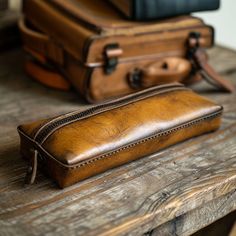 Our leather pencil cases are more than just organizers; they are a symbol of crafted excellence, designed to complement your refined taste. Bandana Ideas, Pencil Holders, Leather Pencil Case, Pencil Cases, Leather Wallets, Toiletry Storage, Cosmetic Bags, Handmade Leather, Leather Working