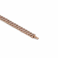 Old-school style gets a modern era update with this Diamond Cuban Link Bracelet. Make a statement in bold 14-karat rose gold links adorned with 6.47 carats of white diamonds. From its diamond-laden clasp to its hefty links, no detail has been overlooked in this new rendition of one of the most iconic jewelry styles. Details14K Rose Gold6.47 Carats of DiamondsLength: 8 Inches Luxury Rose Gold Cuban Link Bracelets, Elegant Diamond Cuban Link Tennis Bracelet, Elegant Diamond Bracelet With Cuban Link, Elegant Cuban Link Diamond Tennis Bracelet, Elegant Cuban Link Bracelet With Diamond Accents, Classic Cuban Link Bracelet With Strap, Classic Rose Gold Bracelets With Solid Link Construction, Elegant Diamond White Cuban Link Diamond Bracelet, Classic Cuban Link Bracelet With Strap Detail