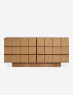 the sideboard is made out of wood and has several compartments on each side,