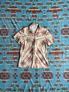 "This shirt has a great look to it and is perfect for everyday wear.  Ca 1970s Mendota button up. Good shape with light expected wear.  PTP: 16.5\" Length: 25.5\" If you have any questions, please send us a message. NGA *free shipping to lower 48 only" Retro Collared Hawaiian Shirt With Relaxed Fit, Retro Relaxed Fit Collared Hawaiian Shirt, Vintage Button-up Hawaiian Shirt For Summer, Spring Retro Print Shirt With Camp Collar, Retro Camp Collar Shirt For Spring, Spring Retro Camp Collar Shirt, Retro Floral Print Shirt With Camp Collar, Retro Fitted Camp Shirt For Spring, Retro Fitted Collared Camp Shirt