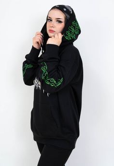 "Black hoodie with a white \"BURNING\" print on front and green flames on hood and sleeves. The model is 167 cm tall and wears size XL. JOIN US ON INSTAGRAM 🌹 http://instagram.com/blvck.pl 🏷 PRODUCT DETAILS 🏷 Hand-printed Unisex 80% High-quality Cotton 20% Polyester Made in Poland 📏 SIZING & FIT 📏 All our sweatshirts and T-shirts are unisex. Measurements (width/length) S - 54/67 cm (21\"/26\") M - 57/69 cm (22.5\"/27\") L - 60/71 cm (23.5\"/28\") XL - 63/73 cm (25\"/29\") XXL - 65/76 cm Green Techwear Hooded Hoodie, Edgy Graphic Print Hoodie For Streetwear, Green Hooded Sweatshirt For Streetwear, Edgy Cotton Hooded Hoodie, Green Long Sleeve Hip Hop Hoodie, Edgy Cotton Hoodie For Winter, Edgy Winter Streetwear Hoodie, Green Techwear Hoodie, Green Hoodie With Drawstring For Streetwear