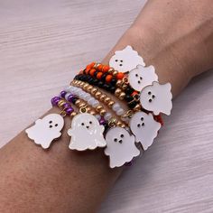 These cute Ghost Stretch bracelets are handcrafted personally for me, Derlis. You can choose your favorite style/color. Also, you can pick your size bracelet. A wonderful gift Perfect gift for friends, family and love ones for Mardi Gras parties, parades, costumes, Halloween &/or Dia de los muertos parties/season, going trick or treating, or as part of your Halloween costume (for both kids and adults) It is very IMPORTANT that you measure your wrist before placing your order to find your correct size bracelet. You can use a flexible tape measure, or a piece of paper, or shoe string, wrap it around your wrist where you would normally put your watch and then use a ruler to measure that piece of paper/string. Write down the measurement in inches adding ½" to that to get your correct size. MAT Novelty White Stretch Bracelet As Gift, White Novelty Charm Bracelet For Gift, White Novelty Charm Bracelet As Gift, White Novelty Stretch Bracelet For Friendship, Novelty White Charm Bracelet Gift, Novelty White Stretch Bracelet With Round Beads, White Novelty Stretch Bracelet With Round Beads, White Handmade Novelty Charm Bracelet, Handmade White Novelty Charm Bracelet