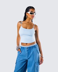 Nothing screams effortless it-girl like this look 👏 This three piece set featuring a blue cami tank top, heather gray mini shorts, and a pair of blue denim parachute pants is the perfect full fit for a relaxed yet chic look 💙 Trendy Blue Tank Top For Streetwear, Spring Blue Tank Top For Streetwear, Blue Tank Top For Spring Streetwear, Blue Tank Top For Summer Streetwear, Summer Blue Streetwear Tank Top, Casual Light Blue Tank Top With Spaghetti Straps, Trendy Short Tank Top For Spring, Casual Light Blue Spaghetti Strap Tank Top, Casual Blue Crop Top With Adjustable Straps