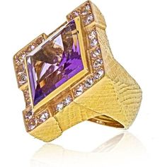 Indulge in the captivating allure of the David Webb 18K Yellow Gold Purple Amethyst Rhombus Ring. This exquisite piece of fine jewelry is an embodiment of elegance and sophistication. Crafted with meticulous attention to detail, it showcases the mastery of David Webb's renowned craftsmanship.The ring boasts an 18K yellow gold band, radiating a warm and inviting glow. Its focal point is a mesmerizing purple amethyst, evoking a sense of royalty and enchantment. The amethyst, with its regal hue, ex Rhombus Ring, Amethyst Birthstone, Rhombus Shape, Emerald Cut Diamond Ring, Purple Amethyst Ring, David Webb, The David, Emerald Cut Diamonds, Amethyst Ring