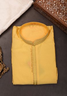 Item: yellow Kurta with off white Pajama Detailing around the neckline and sleeves. No Lining Any celebration gets sweeter when it is done in 'Desi' style! Blending the best of tradition, trend, style, ease, and comfort, our men's line comes in elegant hues that can brighten any occasion. You can wear this Kurta with the Pajama that it comes with or sport a casual Indo-Western look by pairing it over jeans! This Kurta in multiple sizes, please refer to the size chart below for actual measurement Yellow Kurta, White Pajamas, Desi Style, Kurta Pajama, Western Look, Trend Style, Indo Western, Salwar Kameez, Pajama Set