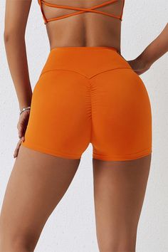 Achieve a peachy shape instantly with our Seam Free Scrunch Mini Shorts! Crafted to hug your curves, these brushed fabric shorts smooth out any imperfections while empowering you to take on the day with confidence. Conquer the world and look great doing it! Features: High waisted fit Seam free Compression waistband Sweat and squat proof Tight cut to the body Rear enhancing shaping and ruching Fabric: Premium brushed fabric Skin-friendly Lightweight Four-way stretch Breathable Quick-drying Sweat- Workout Bottoms With Built-in Shorts In Orange, Moisture-wicking Orange Gym Shorts, Orange Moisture-wicking Short Activewear, Orange Moisture-wicking Shorts Activewear, Orange Moisture-wicking Sportswear Shorts, Conquer The World, Mini Shorts, Squat Proof, Hug You