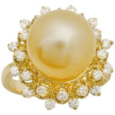 Splendid Natural South Sea Pearl and Diamond 14K Solid Yellow Gold Ring Stamped: 14K Total Natural Pearl Measures: Approx. 12mm Total Natural Round Diamonds Weight: Approx. 0.65 Carats (color G-H / Clarity SI1-Si2) Ring size: 7 (we offer free re-sizing upon request) Ring total weight: Approx. 7.5 grams Disclaimer: all weights, measurements and colors are approximate and may vary slightly from the listed dimensions or as seen in the image. All pictures are magnified to show the smallest of detail Diamond Bracelet Design, Yellow Gold Diamond Ring, Pearl And Diamond Ring, Gold Cocktail Ring, Etsy Gold Ring, Sea Pearl, Gold Band Ring, Natural Pearl, Sea Pearls