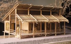 a model of a house made out of wood