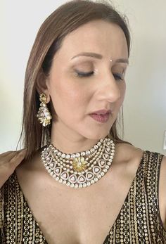 Introducing our exquisite Kundan Necklace, the epitome of elegance and opulence. This stunning piece has just arrived in stock and boasts the highest quality craftsmanship and an unparalleled shine. Handcrafted by master artisans, the necklace features intricately set Kundan stones that radiate brilliance from every angle. Perfect for special occasions or to elevate your everyday look, this necklace is a timeless addition to any jewelry collection. Experience the luxury and grandeur of our fines Luxury Bridal Necklace With Intricate Design, Opulent Round Wedding Necklaces, Opulent Wedding Necklaces, Opulent Party Jewelry With Intricate Design, White Designer Jewelry With 17 Jewels, Designer White Jewelry With 17 Jewels, Dazzling Necklace With Intricate Design, Luxury Diamond White Necklace With Intricate Design, Luxury Kundan Jewelry