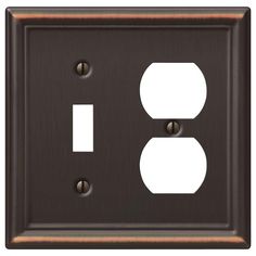 an outlet cover with two outlets and one light switch plate in bronze metal, on a white background