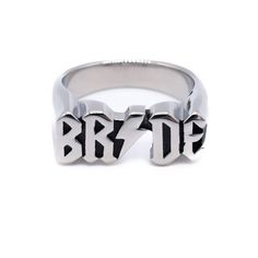 Alternative Bride Ring Make a statement on your Hen-do, or make a pledge to the one you love with this Gothic Promise Ring. IT'S NOT A PHASE, the ultimate stainless steel ring for all you Alternative Brides! INFO: Made from sturdy Stainless Steel, you have no worries about discolouration, the Bride Ring won't leave skin green! Stainless Steel is an extremely strong metal, this ring will not stain, scuff, bend or succumb to damage easily. This is precisely why we love Stainless Steel! This ring is available in 6 sizes. All of our jewellery pieces come with a soft velvet bag with our logo printed in silver foil print as standard! (Excluding Wholesale Orders) Looking for an Alternative Wedding Photographer📸?  Check out our Favourite here - https://shuttergoclick.co.uk Gothic Wedding Ring, Gothic Weddings, Alternative Weddings, Alternative Wedding Ring, Personalized Engagement Rings, Gothic Wedding Rings, Bride Ring, Silver Foil Printing, Gothic Engagement Ring