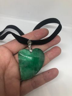 Vintage Green Jade Choker Silver Finish Necklace Pendant https://www.etsy.com/listing/625140468/vintage-green-jade-choker-silver-finish Green Pendant Necklace For Valentine's Day, Green Necklace With Large Pendant As A Gift, Handmade Green Jewelry For Valentine's Day, Green Heart Necklace For Gift, Nickel-free Green Heart Necklace, Green Heart-shaped Nickel-free Necklace, Green Heart Pendant Necklace For Mother's Day, Green Heart-shaped Jewelry Gift, Green Jewelry With Large Pendant For Gift