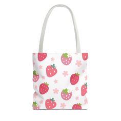 This adorable tote bag is perfect for carrying your essentials. Its vibrant design features strawberries and daisies, adding a touch of whimsy to your everyday look. Bring some fruity and floral fun wherever you go with this cute tote. Available in 3 sizes to add both functionality and style, these tote bags come with multiple handle colors to match your designs. Made with spun polyester, these bags feature double-stitched seams, cotton webbing straps, and nonwoven laminate lining for high-end d Playful White Summer Bag, Playful White Bags For Spring, Red School Bag For Spring, Cute Red Bags For Everyday Use, Cute Spring Canvas Bag For Everyday Use, Cute Spring Tote Bag, Trendy Red Beach Bag, Playful Red Shoulder Bag For Daily Use, Playful Shoulder Bag For Daily Use In Spring