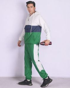 This quarter zip windbreaker Tracksuit outfit is composed of a smooth nylon exterior which is durable. The windbreaker tracksuit is fully meshed lined. Quarter zip windbreaker tracksuits are a great choice for working out at the GYM, on the sports field and everyday casual activities. The relaxed fitting of this windbreaker tracksuit enables maximum movement, comfort for everyday wear and makes it a great choice for the wardrobe. About this item1. Quarter zip windbreaker Track jacket with hoodie Casual Hooded Tracksuit For Outdoor Activities, Hooded Tracksuit For Outdoor Activities, Hooded Moisture-wicking Windbreaker For Training, Sportswear Windbreaker With Pockets For Gym, Moisture-wicking Hooded Windbreaker For Training, Windproof Sportswear Windbreaker For Gym, Green Nylon Windbreaker With Moisture-wicking, Green Nylon Moisture-wicking Windbreaker, Green Moisture-wicking Windbreaker For Sports