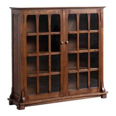 a wooden cabinet with glass doors on the front and bottom shelves in different shapes and sizes