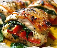 some food is laying on a plate with spinach