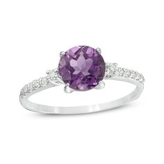 A colorful way to show your love, this gemstone and diamond engagement ring is the start of something beautiful. Crafted in cool 10K white gold, this adventurous style features a 7.0mm bright purple amethyst flanked by a pair of sparkling diamonds. Dainty diamonds line the shank for the perfect touch of shimmer. Radiant with 1/8 ct. t.w. of diamonds and a brilliant buffed luster, this engagement ring is a unique choice to celebrate your romance. Natural Diamond Engagement Ring, Bright Purple, Purple Stones, Amethyst Stone, Sparkle Diamonds, Amethyst Gemstone, Something Beautiful, Diamond Stone, Purple Amethyst