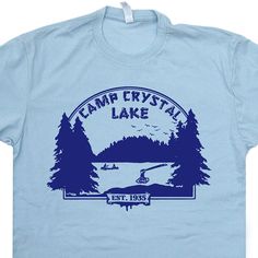 the camp crystal lake logo is shown on a blue towel with trees in the background