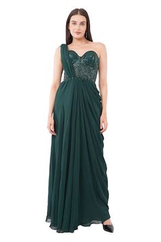 Green gown with sequin bead embellished bodice with attached drape and pleated waistline. - Aza Fashions Pre-draped Embellished Festive Gown, Sequin Draped Dress For Reception, Sequined Draped Dress For Wedding, Sequin Draped Wedding Dress, Embellished Gala Dress With Traditional Drape, Embellished Draped Gown For Reception, Green Embellished Gown With Sweetheart Neckline, Wedding Gown With Sequins And Draped Design, Wedding Gown With Sequins And Draped Shape