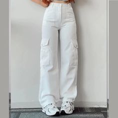 Fabricated with polyester, this garment features a secure zipper closure and a mid-rise waist. DETAILSMaterial: PolyesterClosure Type: Zipper FlyWaist Type: Mid Beige Sweatpants, Celana Kargo, Cargo Pants Streetwear, Celana Fashion, Match Three, Chique Outfit, Batik Pattern, Weave Style, Pant Style