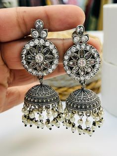 Oxidized silver earrings - jhumki all Blouses come with margin inside for resizing / customization, please leave a message Silver Metal Chandbali Bridal Earrings, Silver Tilla Danglers As Gift, Silver Metal Jhumkas For Party, Silver Fusion Jhumkas With Latkans, Silver Fusion Style Jhumkas With Latkans, Bollywood Style Round Jhumkas With Oxidized Finish, Bollywood Style Oxidized Jhumkas, Fusion Style Sterling Silver Jhumka Earrings, Silver Tilla Earrings For Celebrations