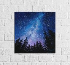 the night sky with stars and trees painted on it