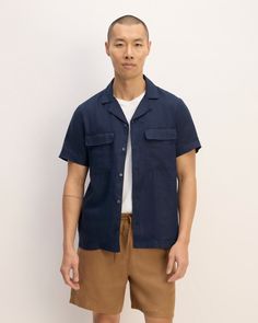 Meet the Linen Short-Sleeve Camp Shirt. This piece features a relaxed fit, short sleeves, camp collar, button closure, and patch pockets with flaps, in linen. Linen Camp Shirt With Camp Collar For Vacation, Spring Linen Tops With Welt Pockets, Linen Camp Shirt With Camp Collar, Linen Camp Shirt With Spread Collar, Linen Camp Shirt With Relaxed Fit For Vacation, Casual Linen Camp Shirt With Camp Collar, Spring Linen Camp Shirt With Relaxed Fit, Relaxed Fit Linen Camp Shirt For Vacation, Relaxed Fit Linen Camp Shirt For The Beach