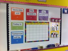 a bulletin board in a classroom with writing and pictures on the back wall that says today is tomorrow