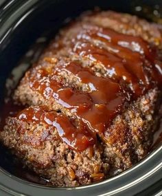 meatloaf in the crock pot with sauce on top