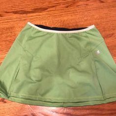 New Balance Shorts/Skort. Excellent Condition. Never Worn Sporty Green Skort With Short Inseam, Casual Green Skort For Sports, Casual Green Tennis Skirt With Built-in Shorts, Sporty Green Mini Skirt, Green Tennis Skirt With Built-in Shorts, Green Short Tennis Skirt With Built-in Shorts, Green Stretch Short Skort, Sporty Short Green Tennis Skirt, Sporty Green Lined Skirt