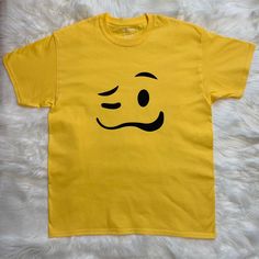 Emoji Shirt - Emoji Birthday T-Shirts - Emoji Halloween Costume Tee Shirts are customized to your personal needs, please let me know if you would like anything changed. Glitter is available upon request. Please see size chart for measurements. Women's shirt runs small, please size up for a comfortable fit. - Shirt is handcrafted with heat transfer vinyl material For best care, wash inside out, machine wash cold and tumble dry low. Please visit my Instagram page for more designs and contact me fo Casual Yellow Top For Halloween, Casual Yellow Halloween T-shirt, Fun Character Print T-shirt, Black Smiley Face Crew Neck T-shirt, Black Crew Neck Top With Smiley Face, Black Smiley Face Crew Neck Top, Black Crew Neck T-shirt With Smiley Face, Basic Crew Neck T-shirt For Birthday, Casual Yellow T-shirt