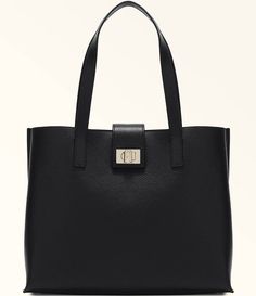 From Furla&#x2C; the 1927 Large 36 Soft Tote Bag features:Grained leatherCentral partition with zip closureTwist closure with the Furla logo engraved on the front Spacious and versatileMetal feet Approx.: 14.17" L x 11.22" H x 5.70" WImported. Satchel Bag With Logo Hardware For Daily Use, Luxury Shoulder Bag With Logo Hardware For Daily Use, Modern Bags With Logo Hardware For Daily Use, Everyday Shoulder Bag With Logo Hardware, Formal Tote Shoulder Bag With Logo Hardware, Elegant Tote Bag With Logo Hardware, Modern Bags With Logo Hardware, Rectangular Leather Bag With Logo Hardware, Everyday Satchel Bag With Logo Hardware