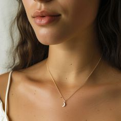 "A delicate crescent moon or star pendant in sterling silver or gold. This necklace is a perfect gift for the magical person in your life or for yourself!  DETAILS  *Silver: 925 sterling silver with tarnish-resistant finish *Gold: gold plated 925 sterling silver *Pendant: 10mm length *Necklace length: 16\" or 18\" plus a 1.5\" extender  PACKAGING  Each item has its own simple gift package (refer to the photo) Orders marked as gifts will print without the price and include any gift message. Please note: items on the photo may appear larger than in real life. For accurate dimensions, please see the item size details above. Colours may also vary slightly due to light conditions and your monitor display settings." Dainty Moon Shaped Jewelry For Everyday, Dainty Moon-shaped Jewelry For Everyday, Dainty Sterling Silver Half Moon Charm Necklace, Dainty Half Moon Sterling Silver Charm Necklace, Dainty Half Moon Phase Charm Necklace, Dainty Crescent Charm Necklaces For Everyday, Dainty Half Moon Charm Necklace With Moon Phase, Delicate Moon Phase Charm Necklace, Delicate Moon Phase Charm Necklaces