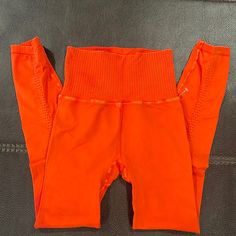 Nwot Good Karma Leggings Snug Fit High Waist Pants For Gym, High Waist Snug Fit Pants For Gym, High Waist Snug Fit Gym Pants, Casual High Stretch Orange Bottoms, Sporty High Waist Snug Fit Pants, Sporty High Waist Pants With Snug Fit, Orange Stretch High-waisted Pants, Orange High Waist Stretch Activewear, High Waist Stretch Orange Activewear