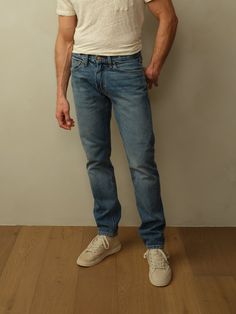 Berlin Blue Slim Fit Medium Wash Pants With Pockets, Blue Slim Cotton Jeans, Classic Medium Wash Fitted Pants, Classic Fitted Medium Wash Pants, Fitted Classic Medium Wash Pants, Fitted Slim Cotton Jeans, Medium Wash Straight Hem Rigid Denim Jeans, Medium Wash Rigid Denim Jeans With Straight Hem, Everyday Rigid Denim Jeans With Standard Cut Leg