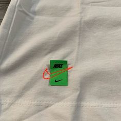 Nike Shirt That Gives Off White Vibes Mew With Tags White Sporty T-shirt With Branding, White Long Sleeve T-shirt With Branding, Nike White Tops For Summer, White Sporty Branded T-shirt, White Cotton T-shirt With Logo Print, Nike Cotton Tops Relaxed Fit, Basic White Nike Top, Sporty White Cotton Top, White Cotton Graphic Tee