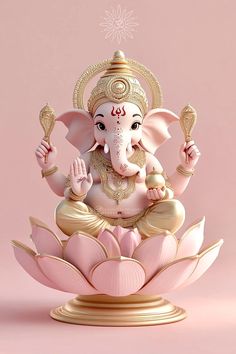 an elephant statue sitting on top of a pink flower