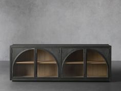 a black cabinet with three open shelves on the front and two closed doors on the back