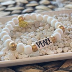 Affirmation bracelets featuring a hand-lettered affirmation focal bead and our abstract print beads and gold logo charm. Stretchy to fit most wrists. Word Bracelets, Affirmation Bracelets, Sweet Grace, Word Bracelet, Words Of Affirmation, Sneaker Slippers, Book Candle, Spirit Wear, Valentine Special