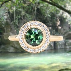 1.29ct Round Untreated Songean Green Sapphire Bezel Set Diamond Halo Ring in 14k Yellow Gold Rosecut Diamond Ring, Diamond Halo Ring, Halo Setting, Bezel Set Diamond, Custom Ring Designs, Antique Inspiration, Jewelry Ring Box, Green Sapphire, Matte Satin