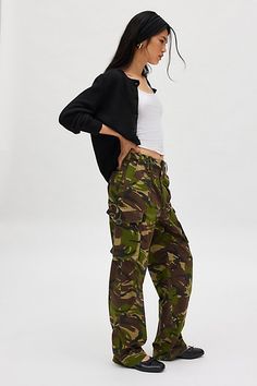 Original vintage pants sourced by Urban Renewal. Allover camo print pant in a mid-rise and straight fit featuring painter detailing in their original deadstock form. Each pair will come to you as pictured. Features Urban Renewal Vintage camo painter pant Original vintage pant Allover camo print Mid rise waistline Pocket detailing down legs Relaxed fit Full length Zip fly and button closure Deadstock style as pictured here Content + Care Cotton, polyester Machine wash Size + Fit Model in Camo is Camouflage Relaxed Fit Straight Leg Cargo Pants, Relaxed Fit Camouflage Cargo Pants For Fall, Camouflage Relaxed Fit Pants For Fall, Relaxed Fit Camouflage Pants For Fall, Camo Print Pants, Print Pant, Painters Pants, Vintage Clothes Women, Urban Renewal