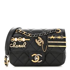 This is an authentic CHANEL Lambskin Quilted Mini Coco Clips Single Flap in Black. This chic bag is crafted of black lambskin leather with aged gold Chanel "clips" on the crossover flap. The bag features a leather-threaded aged gold and ruthenium chain shoulder strap and a matching CC turn lock. The front flap opens to gold leather interior with a patch pocket. Chanel Mini Bag, Chanel Mini, Gold Chanel, Luxury Purses, Leather Thread, Chic Bags, Chanel Black, Gold Leather, Leather Interior