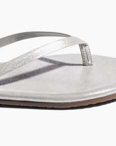 For a little extra something. A glittery take on the style that started it all. Handcrafted from soft Brazilian leather in a classic flip flop silhouette. Throw on and go—we added a cushioned insole and rubber outsole for extra comfort. Summer Shimmer Synthetic Sandals, Summer Synthetic Sandals With Shimmer, Adjustable Glitter Casual Sandals, Casual Adjustable Glitter Sandals, Shimmer Sandals For Beach And Summer, Shimmer Sandals For Beach In Summer, Silver Synthetic Sandals With Cushioned Footbed, Silver Sandals With Cushioned Footbed, Shimmer Open Toe Sandals For Beach