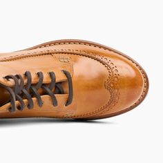 Amber Italian veg tan leather. Comes with two laces. 2.5" (60mm) heel. Lightweight lug sole. Cork midsole that shapes to your foot. This shoe can be resoled. Handcrafted in Portugal. Veg Tan Leather, Lug Sole, Tan Leather, Leather Women, Cork, Amber, Oxford, Portugal, Boots