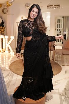 Black pre-draped saree crafted in net and satin silk with midnight bloom garden embroidery using tonal sequins, beads highlights and frilly ruffle detailing on the saree skirt and pallu. Paired with a full sleeves sequin fleur garden embroidered sheer blouse. - Aza Fashions Shimmer Saree Blouse Design, Black Saree With Full Sleeve Blouse, Glamorous Pre-draped Saree With Resham Embroidery For Reception, Elegant Evening Pre-draped Saree With Resham Embroidery, Glamorous Saree With Intricate Embroidery, Evening Embellished Pre-draped Georgette Saree, Embellished Pre-draped Saree For Diwali Evening, Glamorous Pre-draped Saree With Resham Embroidery, Evening Saree Blouse Piece With Resham Embroidery