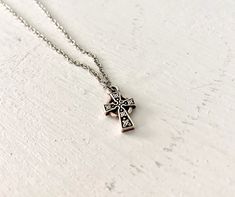 Tiny antiqued silver plated Celtic cross necklace on a dainty stainless steel chain. Details Tiny cross measures just over 5/8 inch long by 3/8 inch wide Choose your chain length at checkout. VISIT MY SHOPS HERE * http://www.etsy.com/shop/HappyCatHouse * http://www.Etsy.com/shop/AnEnchantingCreature CONNECT * http://www.facebook.com/EnchantingCreature * https://instagram.com/enchantingcreature * https://www.pinterest.com/enchantingcreature * @EnchantingCreature NEW TO ETSY? A great tutorial to a Antique Silver Nickel-free Cross Pendant Necklace, Nickel Free Antique Silver Cross Pendant Necklace, Nickel-free Antique Silver Cross Pendant Necklace, Antique Silver Cross Necklace With Oxidized Finish, Antique Silver Cross Pendant Necklace For Gift, Antique Silver Oxidized Cross Necklace, Gift Cross Necklace With Oxidized Finish, Oxidized Cross Necklace As Gift, Oxidized Finish Cross Necklace As Gift