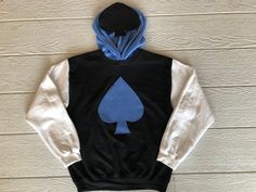 Undertale Delta Rune Deltarune Lancer shirt, hooded sweatshirt, costume, cosplay shirt, black with white sleeves,blue hood. Spade appliqué by CuriousCallipipper on Etsy https://www.etsy.com/listing/677098599/undertale-delta-rune-deltarune-lancer Deltarune Cosplay, Sweater Outfits Men, Delta Rune, White Sleeves, Black Hooded Sweatshirt, Costume Cosplay, Striped Sleeve, Cosplay Outfits, Edgy Outfits