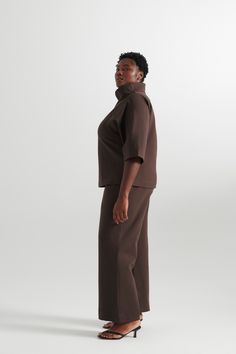 Description A sleek, A line top with 3/4 sleeves that hits at the hip. Clean lines and a rolled stand collar with subtle drape emphasize the modernity of the silhouette.The Katy top is crafted in a luxurious four-way stretch ponte fabric. Details 68% Viscose, 27% Nylon, 5% Spandex Dry Clean Only Free Shipping and Free Returns on All Orders More Questions? Email: admin@paripassushop.com A Line Top, Dress Pant, Fabric Details, Ethiopia, Brunei, Clean Lines, Stand Collar, Espresso, A Line