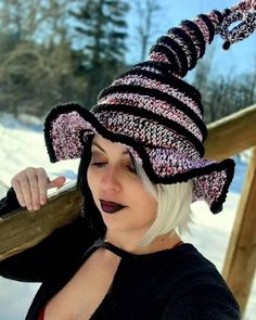 "🌟FREE SHIPPING Need a fun accessory to spice up your Halloween costume this year? Thinking about attending a Cosplay event? Then this twisted witch/wizard hat is perfect for you!  Hat is stirched up in 100% acrylic black/white & strawberry mixed color yarn!!.  Stuffed at the top for a sturdy yet flexible hold!  Hat also features a rhinestone black rock pendant on the tiptop. Available in sizes: Child: 19\"-20\" Adult Small: 20\"-21\" Adult Med: 21\"-22\" Adult Large: 22\"-23\" If you prefer changing any colors in this item that are not listed, please message me before placing your order. 🌟Hand wash cold - lay flat to dry Patrern credit shout out to Crochetverse Please be sure to view my policies page: https://www.etsy.com/your/shops/TjCrochetCreations/policies See more of my items in my Hat Cosplay, Rock Pendant, White Strawberry, Halloween Witch Hat, Witch Costume, Witch Hat, Halloween Witch, Witch, Halloween